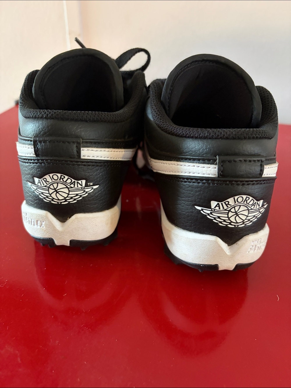 Nike Black and White Kids Cleats